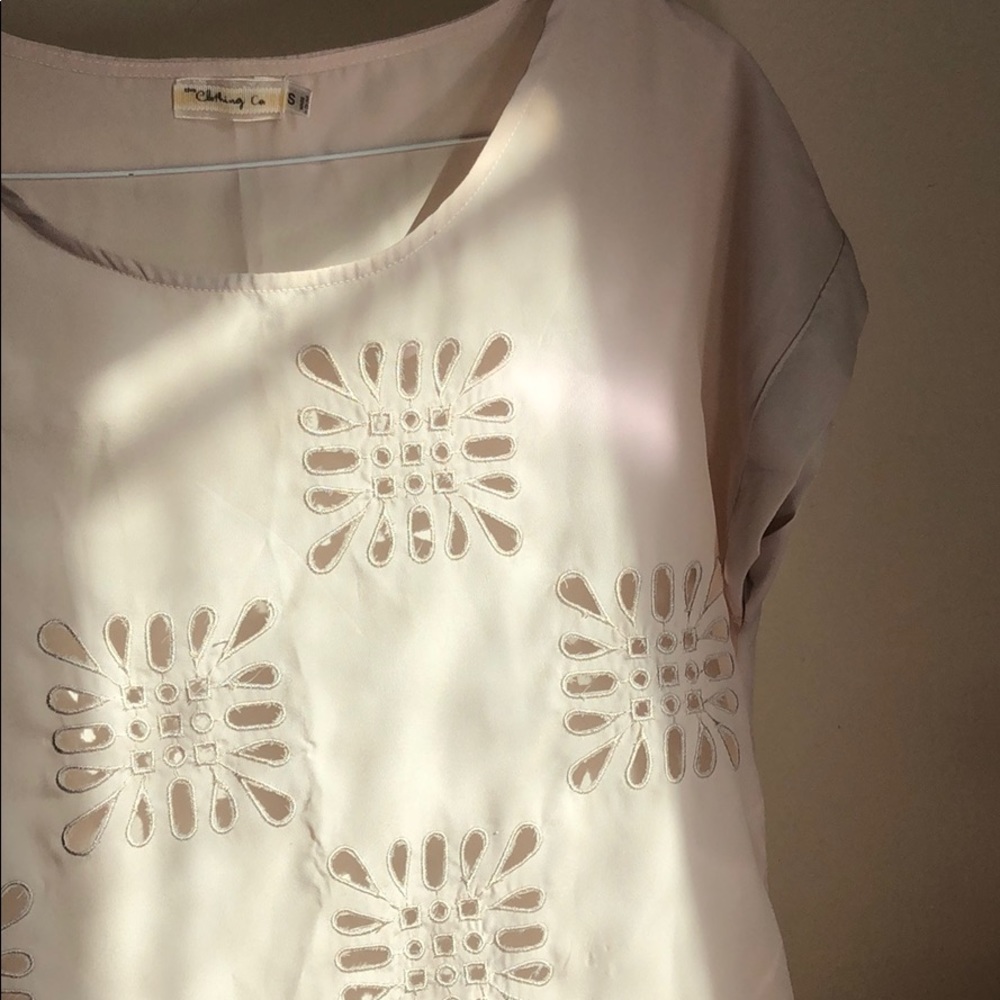 beige shirt